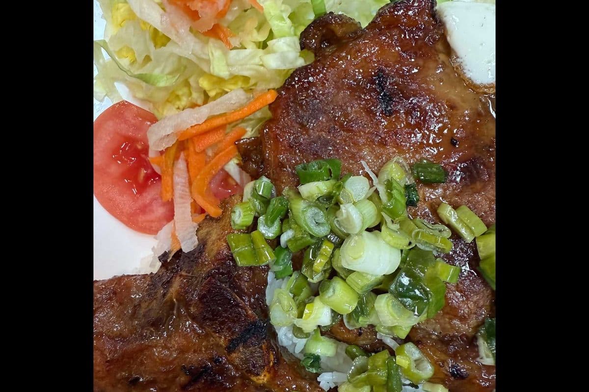 24. Grilled Lemon Grass Pork Chop on Rice