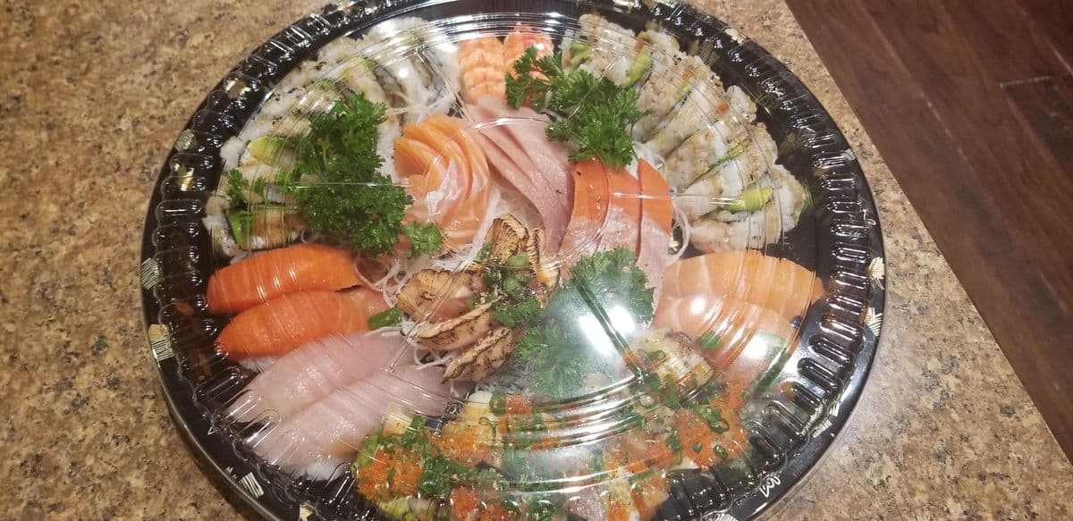 Tray D (One Special Roll, Four Regular Roll, Sashimi (Six pcs), Nigiri (6 pcs))