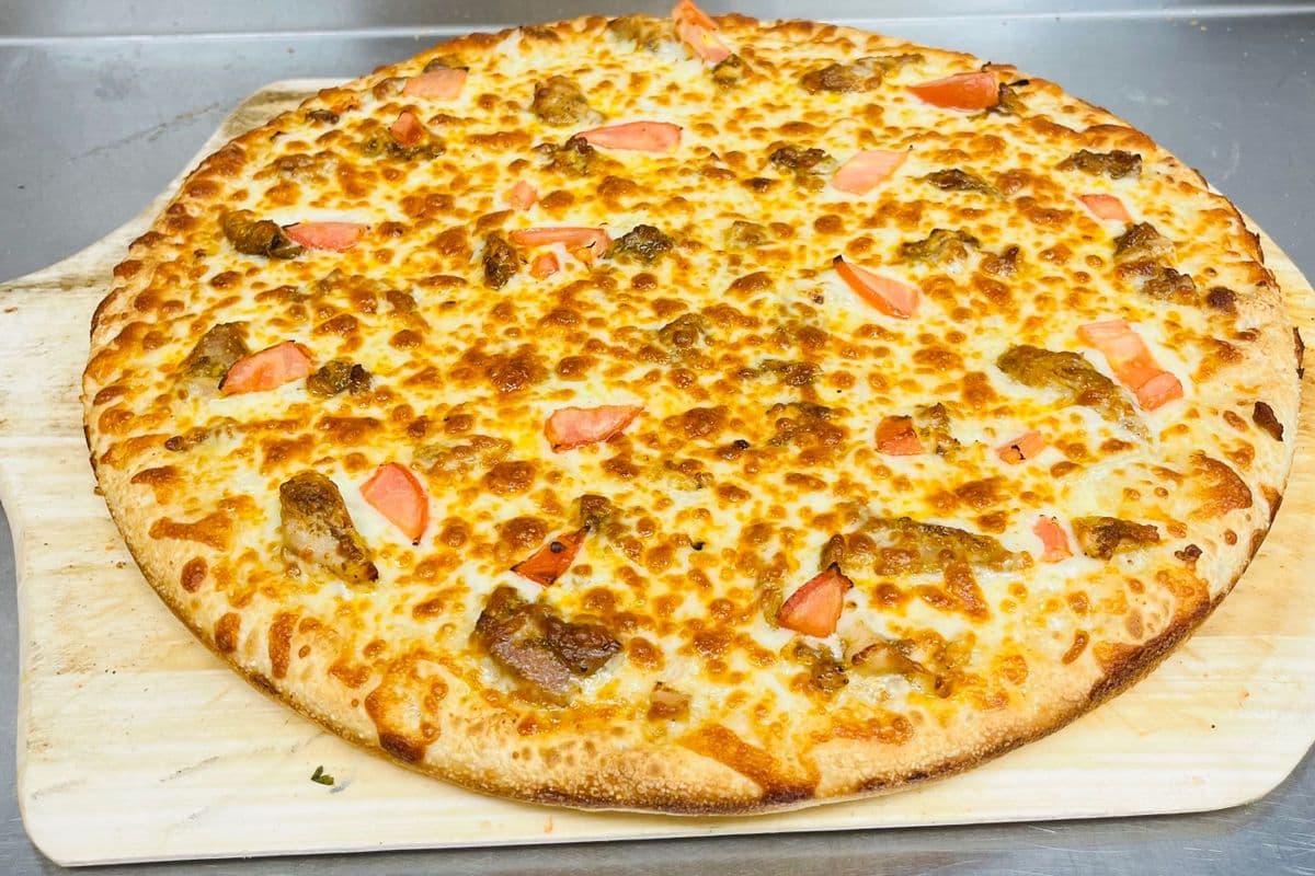 12" Medium Signature Chicken Shawarma Pizza and Choice of Second Pizza