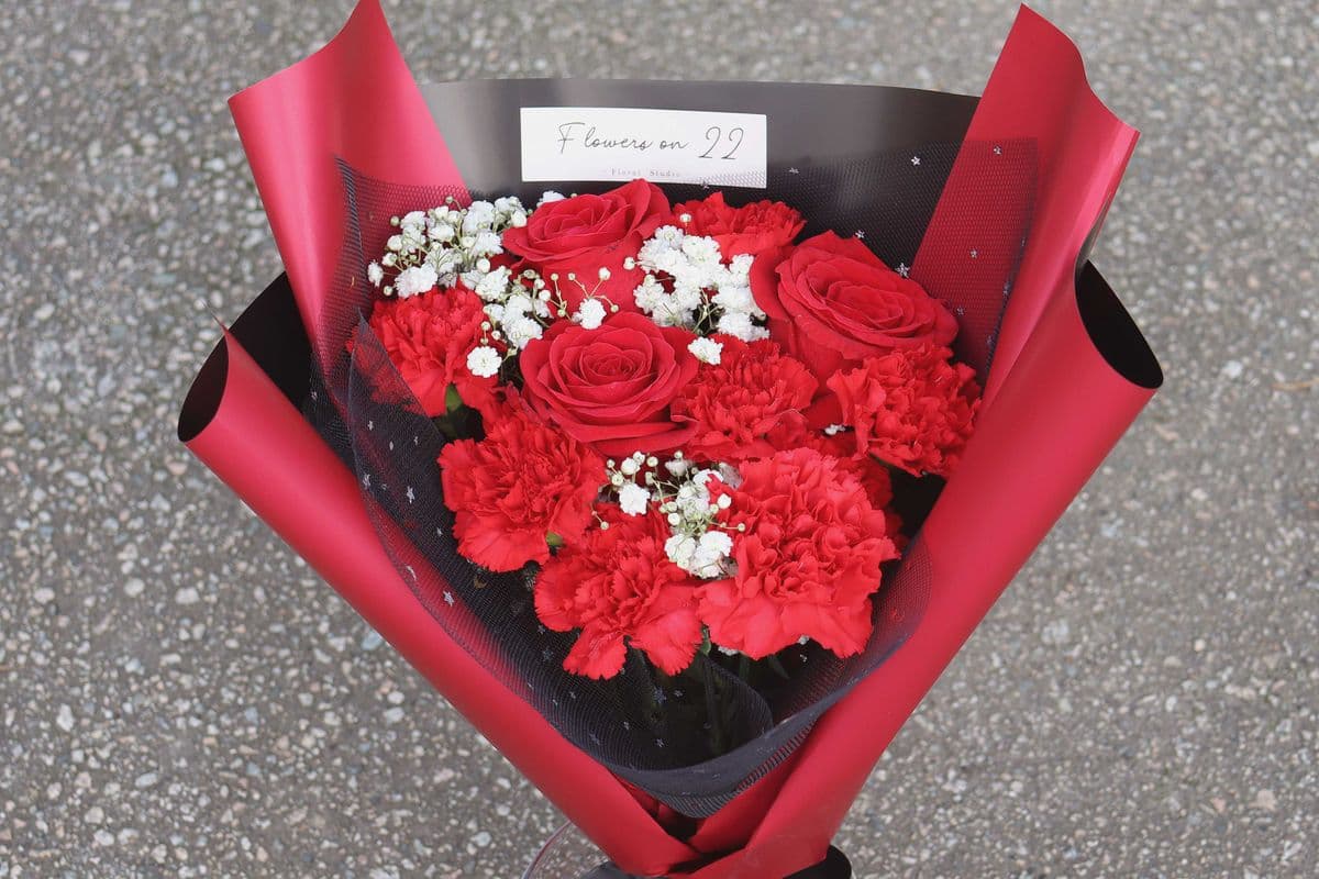 R12. Red Roses and Carnation Mixed Bouquet