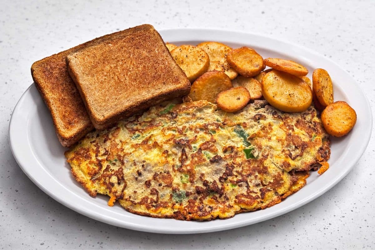 STEAK 'N' CHEEESE OMELETTE(on,mu,gp)