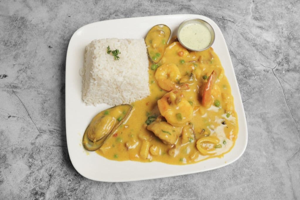 Filet de poisson avec sauce aux fruits de mer / Pescado a lo macho
