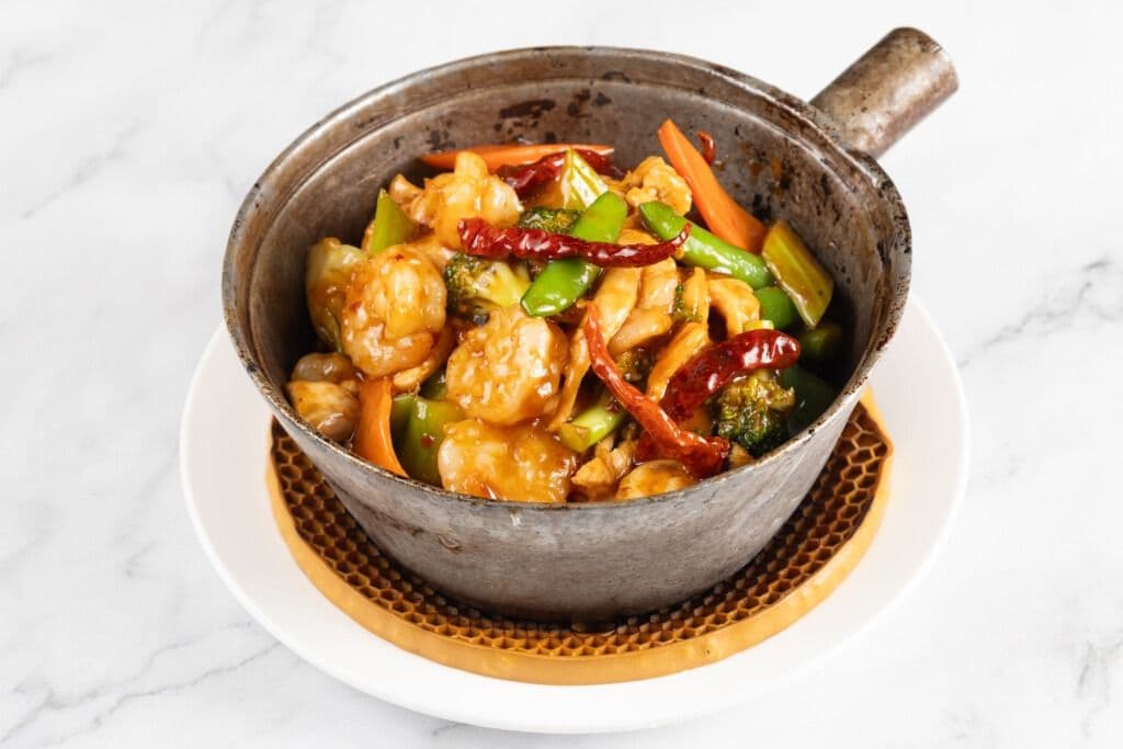 Shrimp, Chicken and Mixed Vegetables with Spicy Sauce in Hot Pot