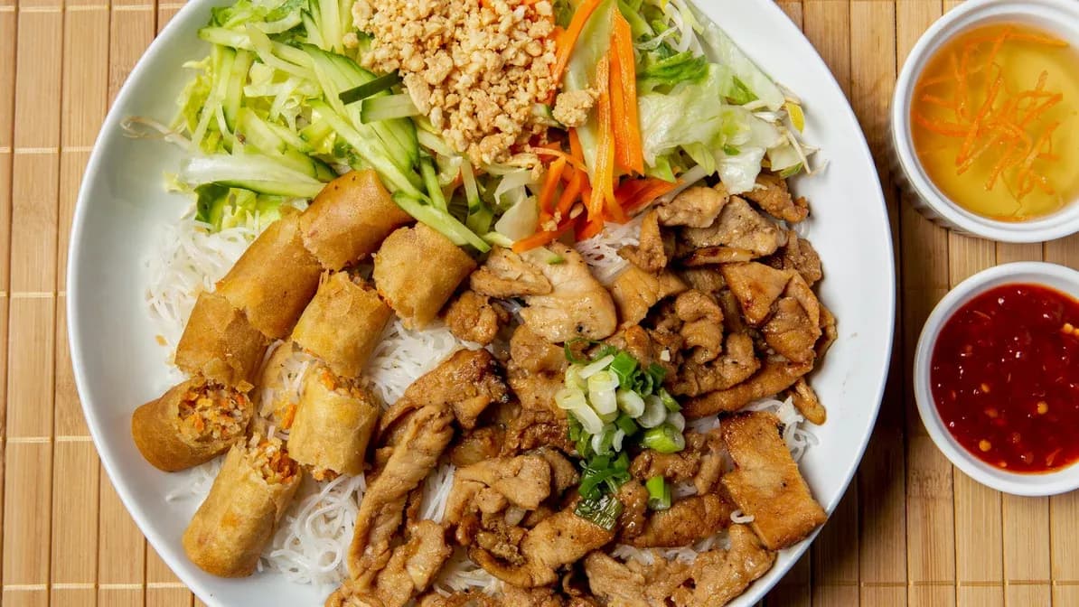 B23. Vermicelli with Spring Rolls and Grilled Pork