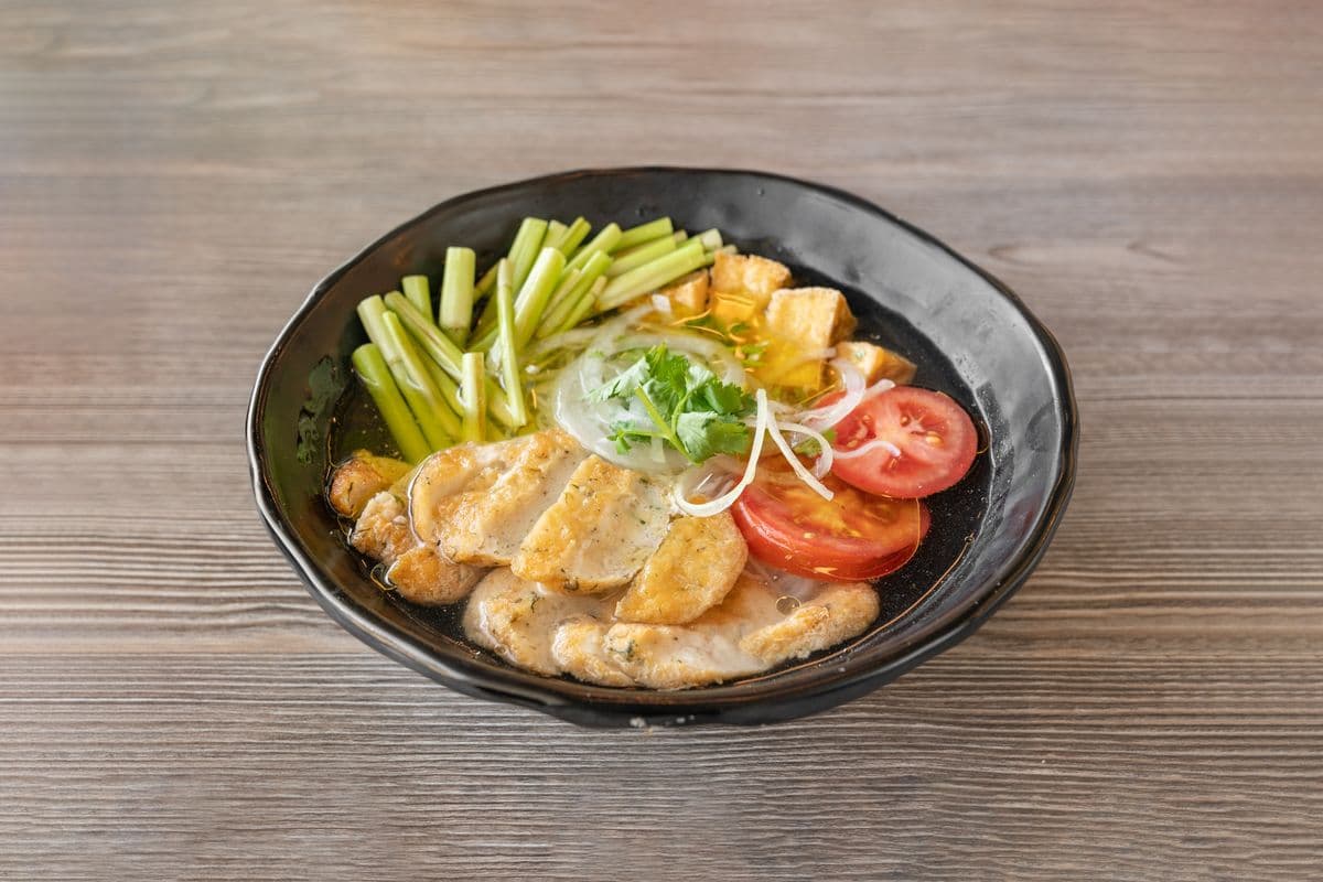 19. Thin Vermicelli Noodle in Tomato Soup with Fish Cake, Tofu, and Ham