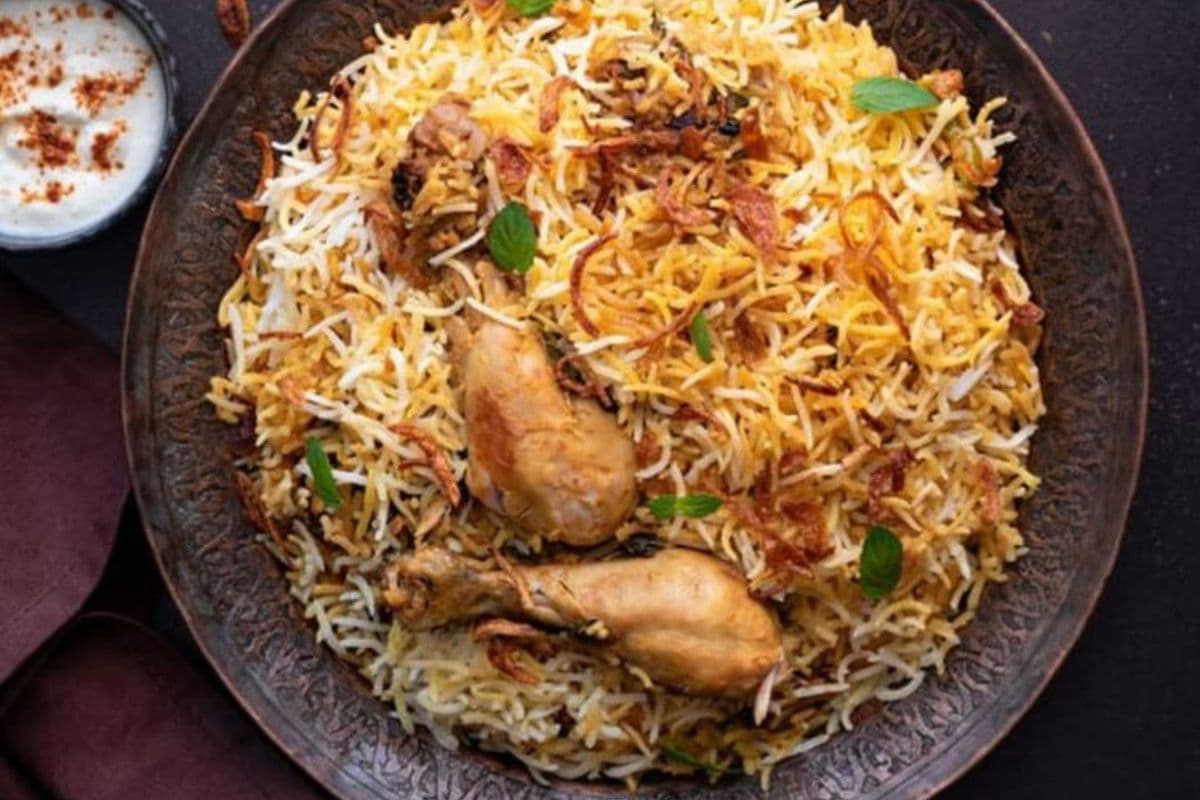Hyderabadi Chicken Dum Biryani with a Drink