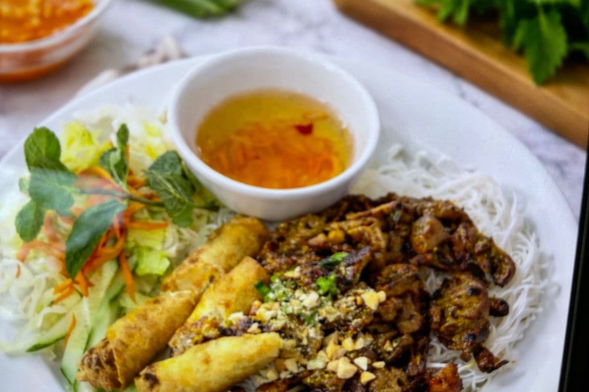 Grilled Pork and Spring Rolls on Vermicelli