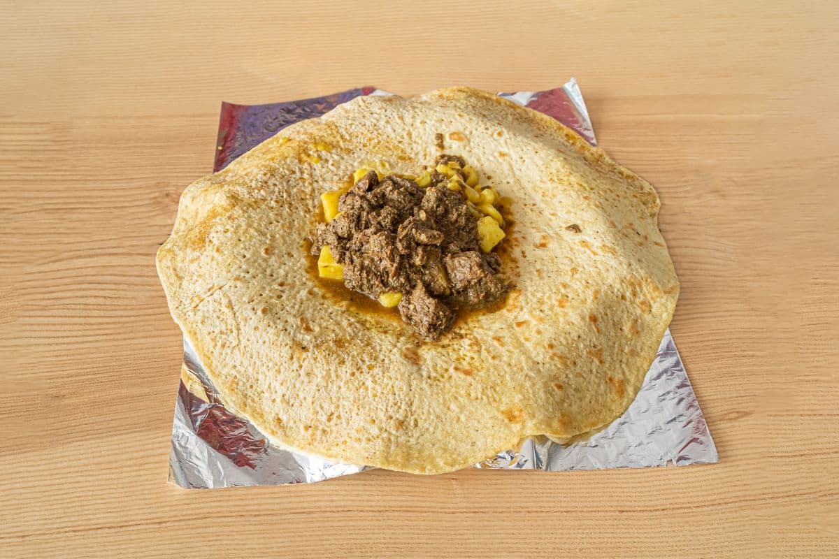 Curry Goat Roti (Boneless)