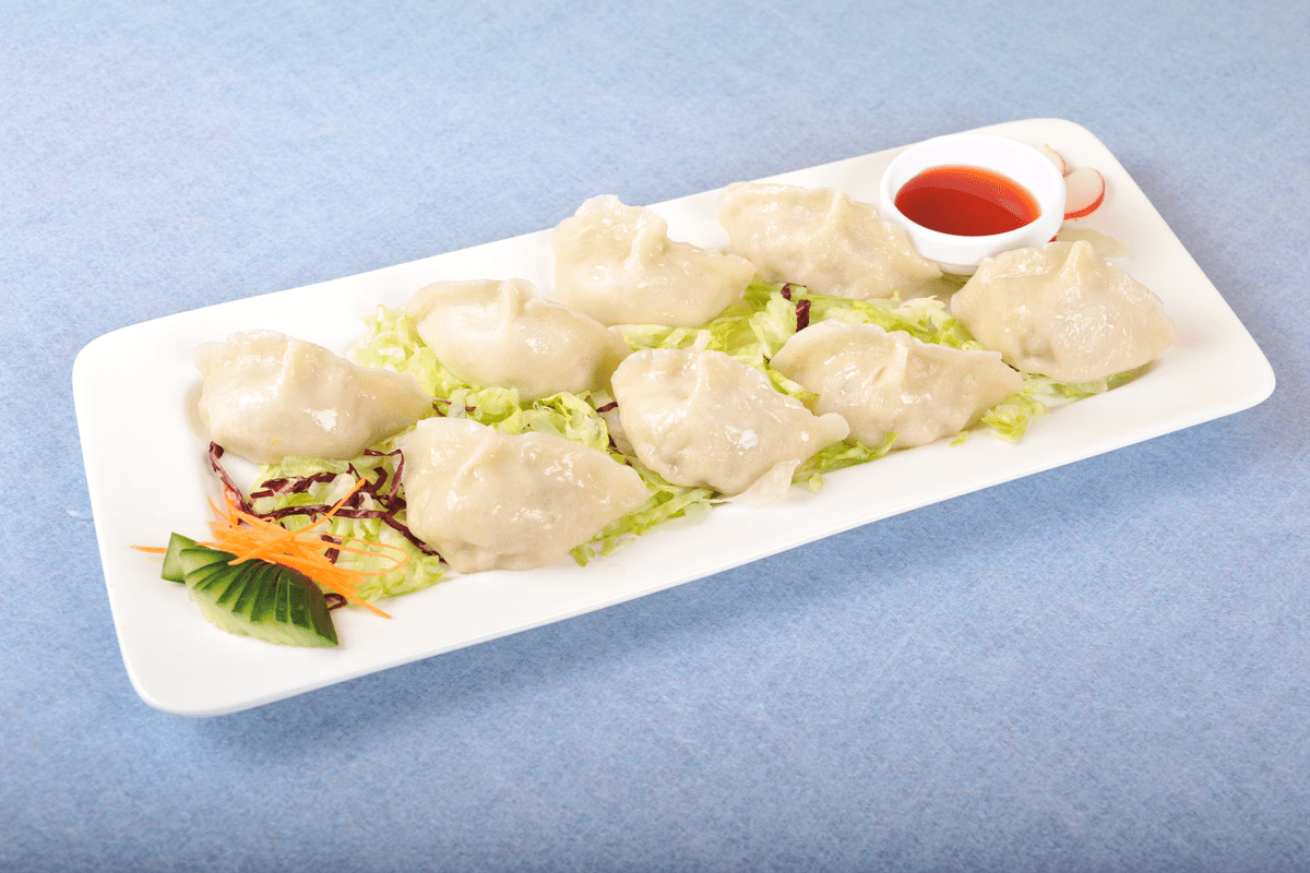 9. Steamed Chicken Dumplings (10 pcs)