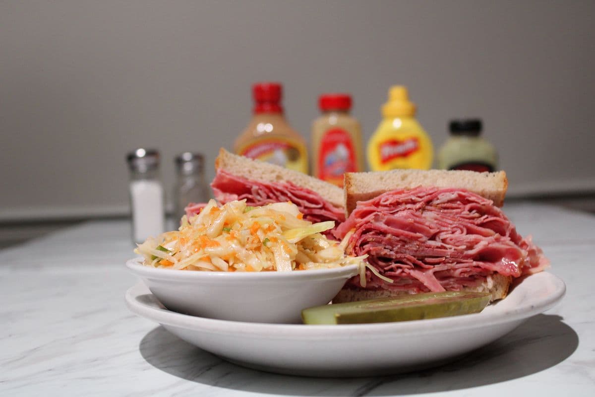 Corned Beef, Coleslaw, and Sweet Red Pepper on an Onion Bun Sandwich Combo