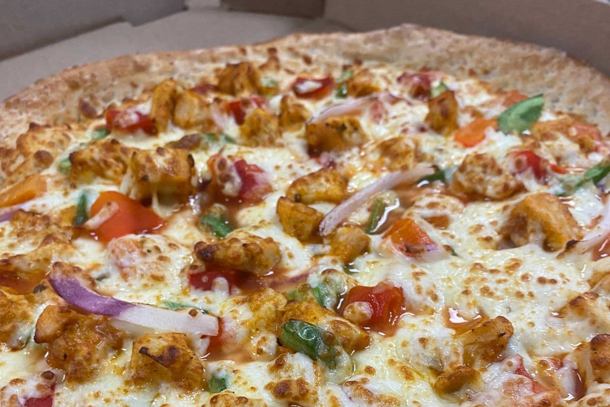 Large Butter Chicken House Choice Pizza