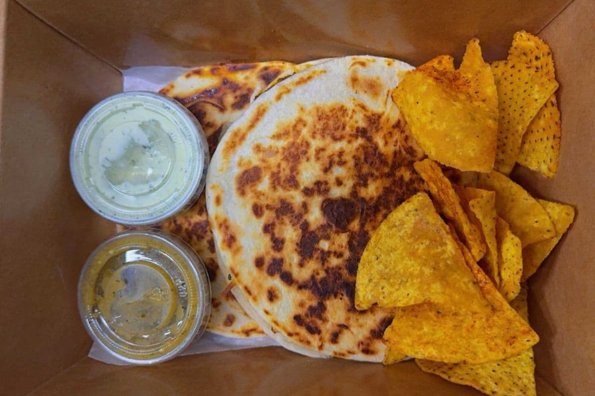 Flour Quesadilla **w/chips and salsa**