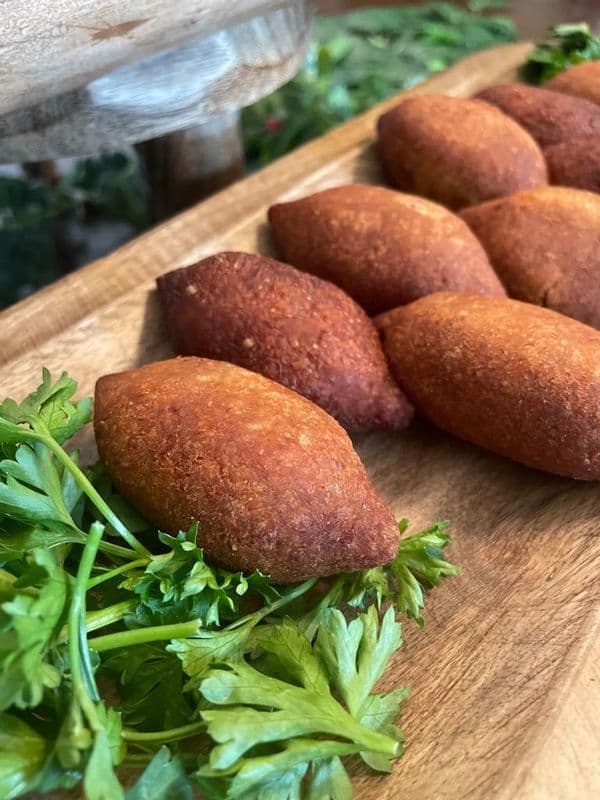 Five Pieces Fried Kibbeh with Tabbouleh, Hummus Dip, and Yogurt Drink