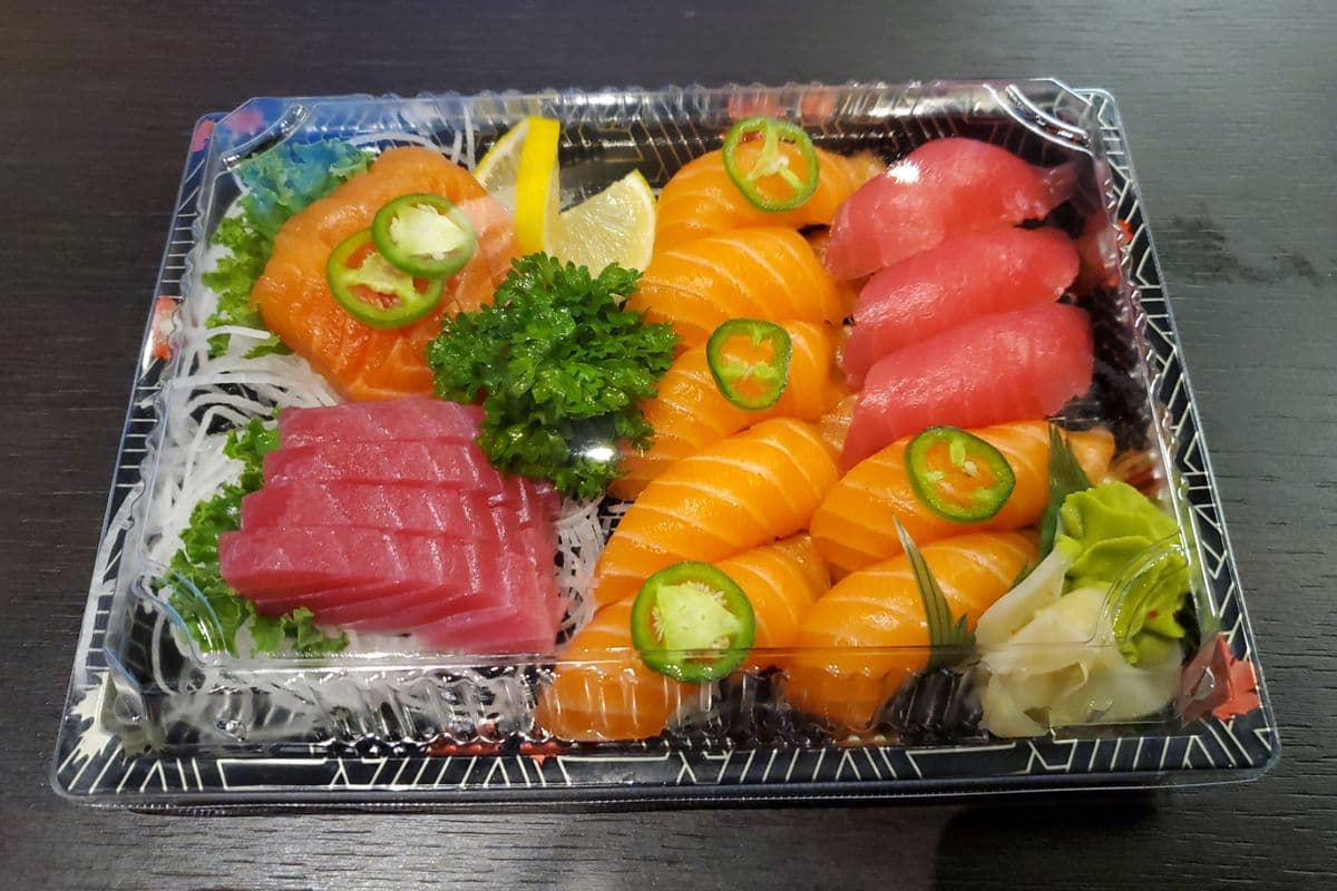 204. Salmon and Tuna Sashimi (8 pcs), Salmon Sushi (7 pcs), and Tuna Sushi (3 pcs) Set