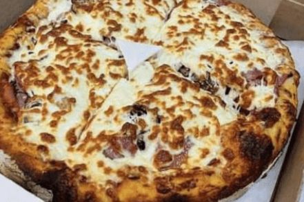 Pizza large toute garnie plus