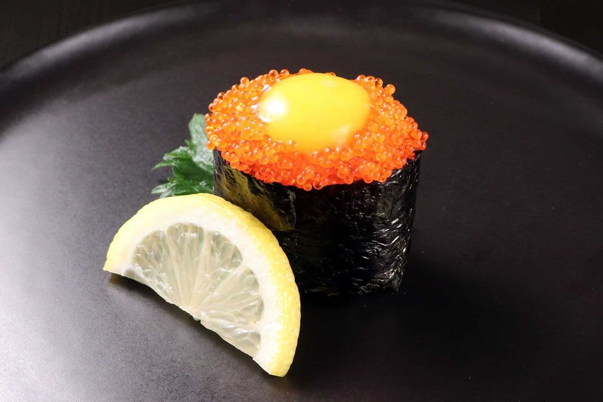 Tobiko with Quail Egg Raw Fish Nigiri Sushi