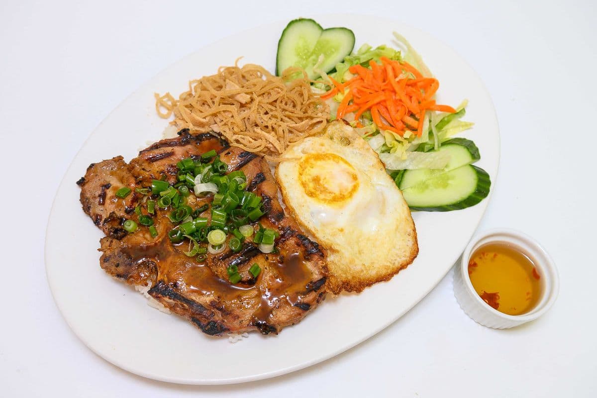 67. Grilled Pork Chop, Fried Egg and Shredded Pork Skin on Steamed Rice