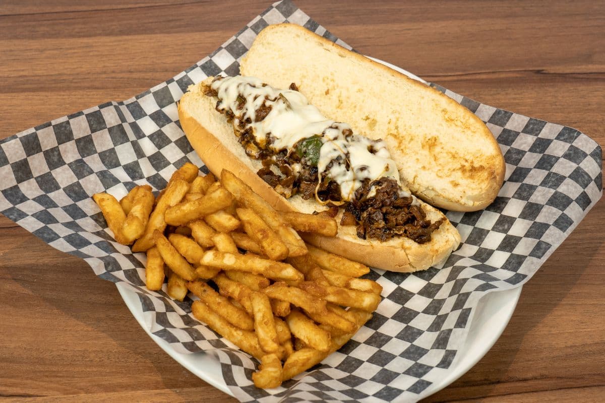 Original Philly Cheesesteak Sandwich with fries