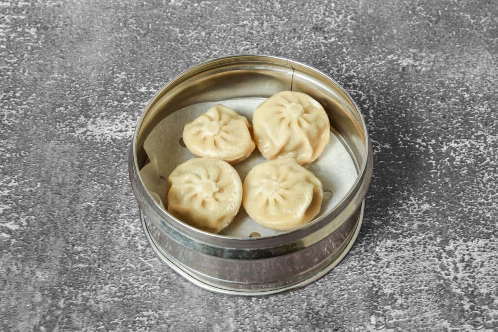 K20. Juicy Shanghai Steamed Pork Dumplings (4 pcs)