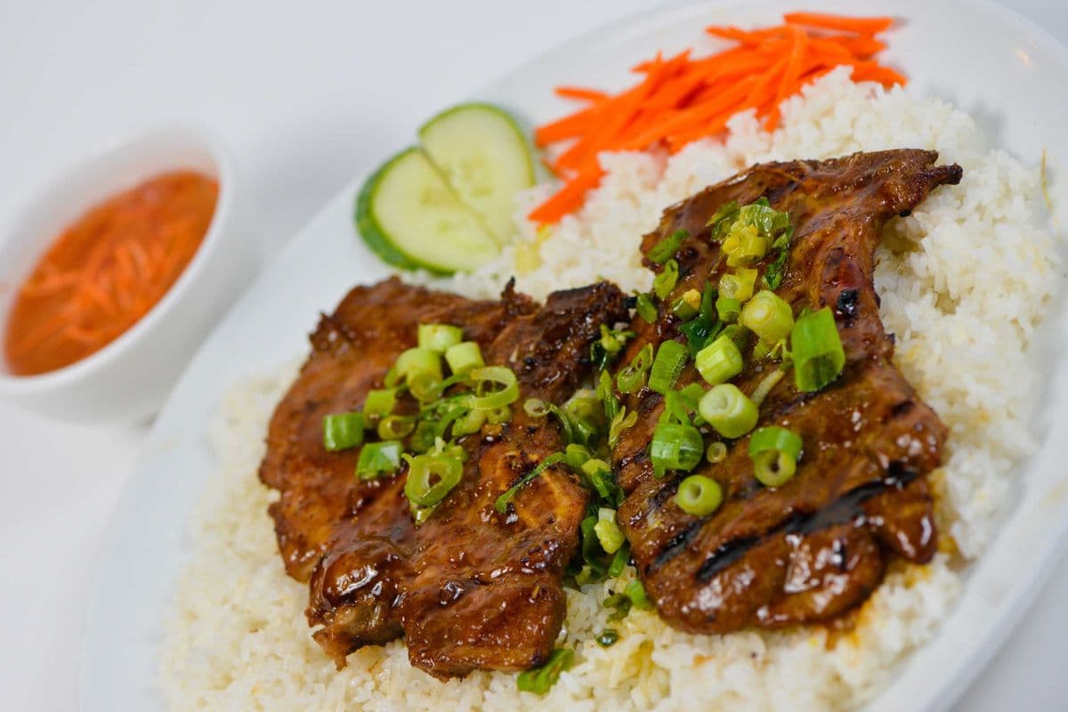 48. Char-Broiled Pork Chop (2 pieces) on Steamed Rice - Com Suon Nuong
