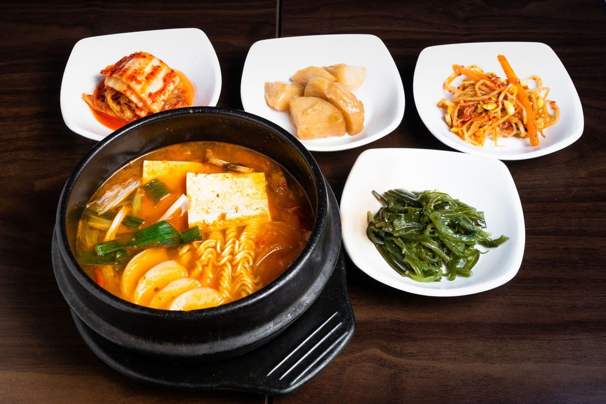 M11. Spicy Hot Stew with Mixed Vegetables, Sausages, and Rice Cakes