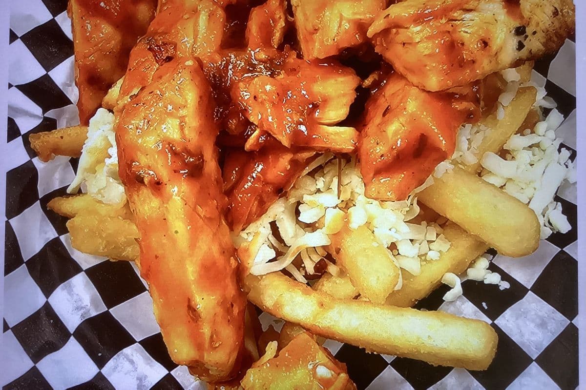 BUTTER CHICKEN POUTINE
