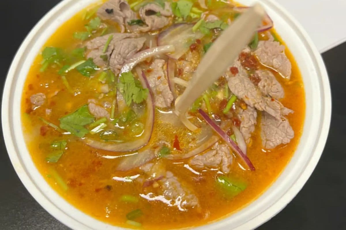 P44D Coconut Peanut Satay Medium Rare Beef Noodle Soup