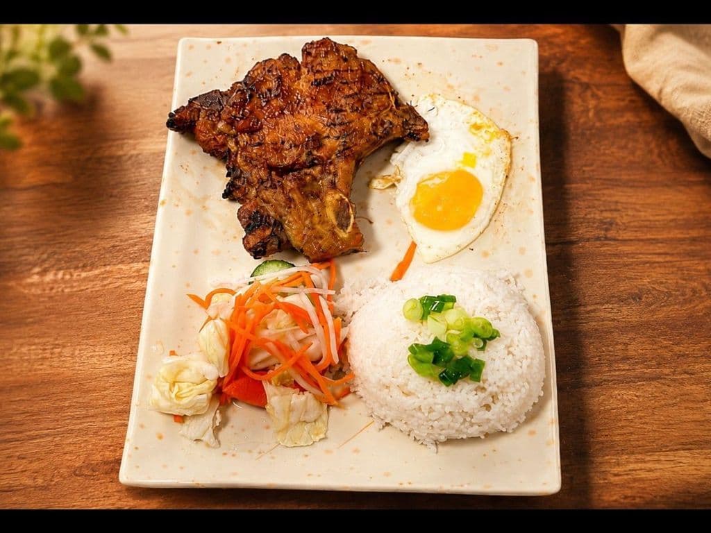503. Grilled Pork Chop and Fried Egg on Rice
