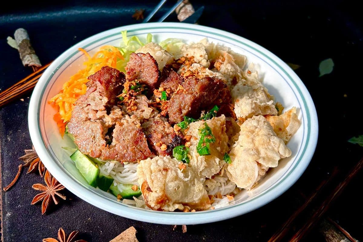 54. With Spring Rolls and Pork on Skewer