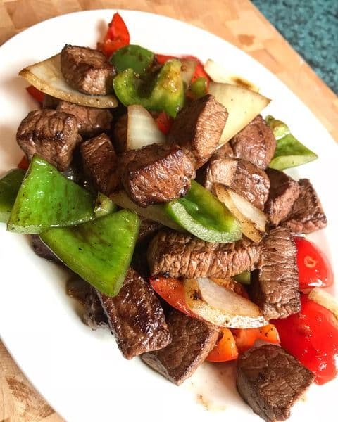 79. Stir Fried Beef Cubes with Red and Green Peppers, Onions, and Lemon Pepper Sauce
