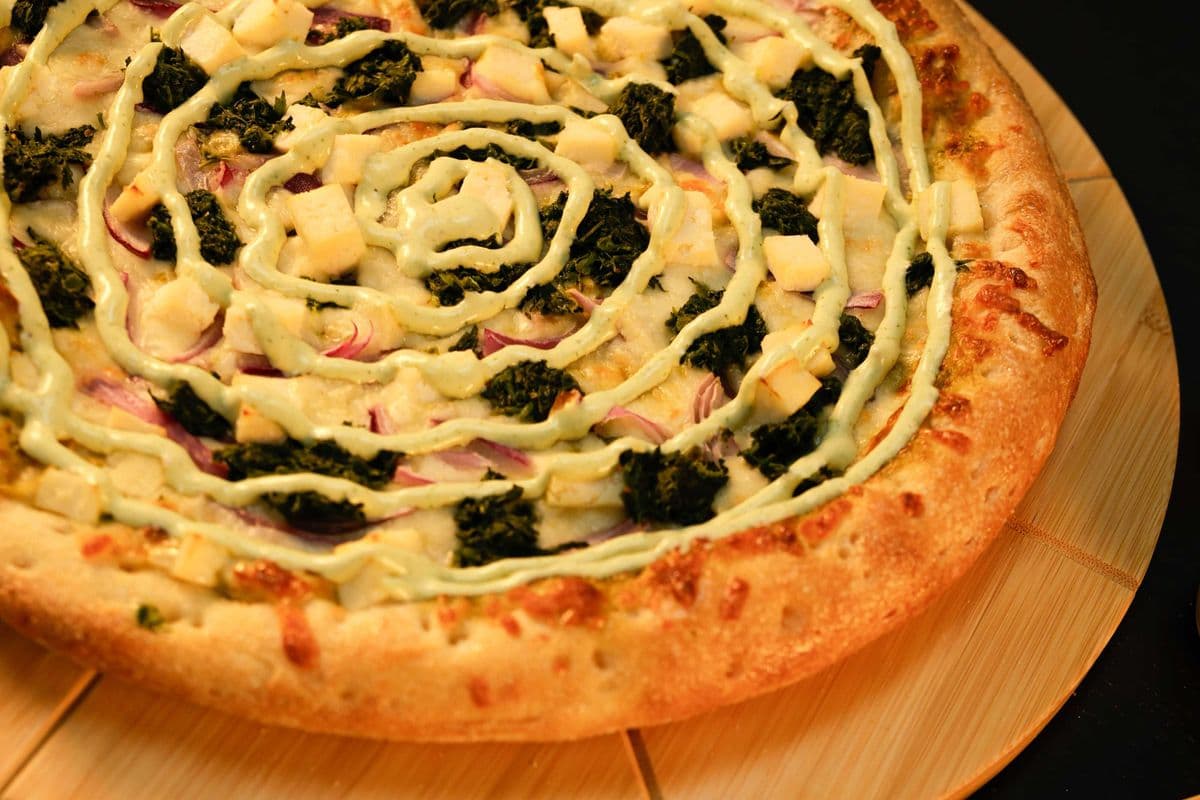 Palak Paneer/Chicken Pizza