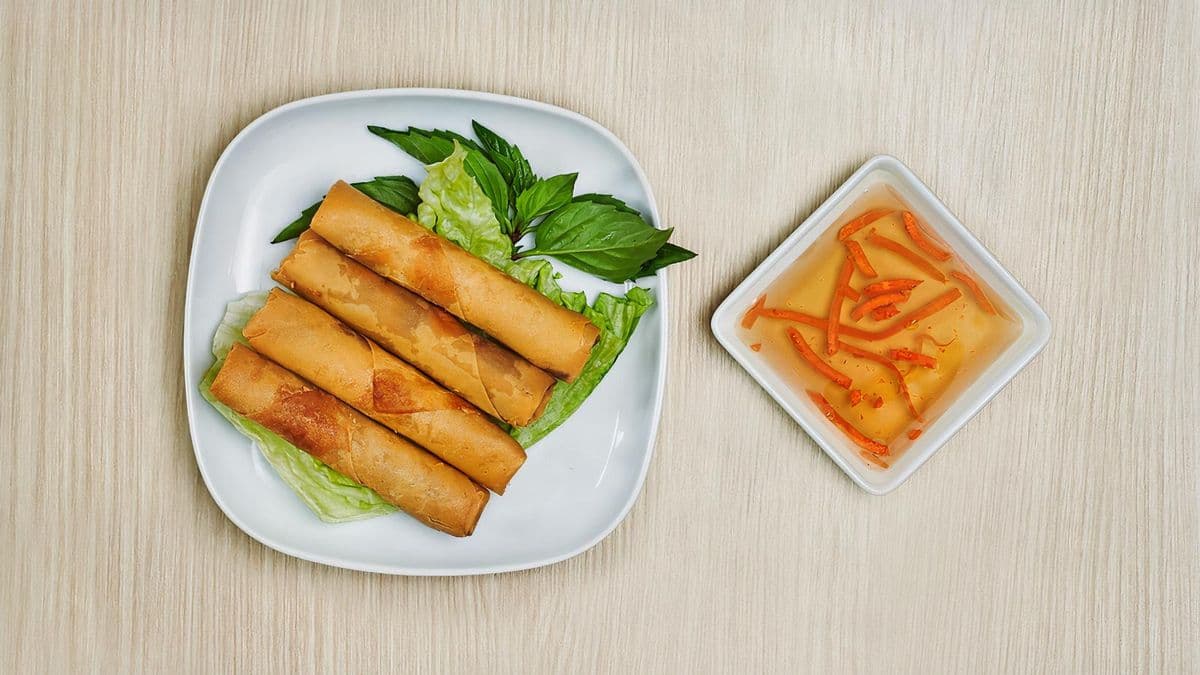 18. Deep Fried Regular or Rice Paper Spring Rolls (4 Rolls)