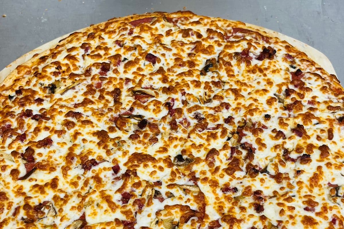 10" Canadian Feast Pizza and Choice of Second Pizza