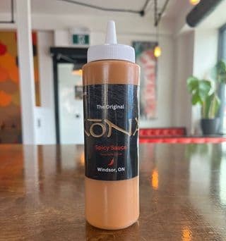 Bottle of Spicy Kona Sauce 8oz