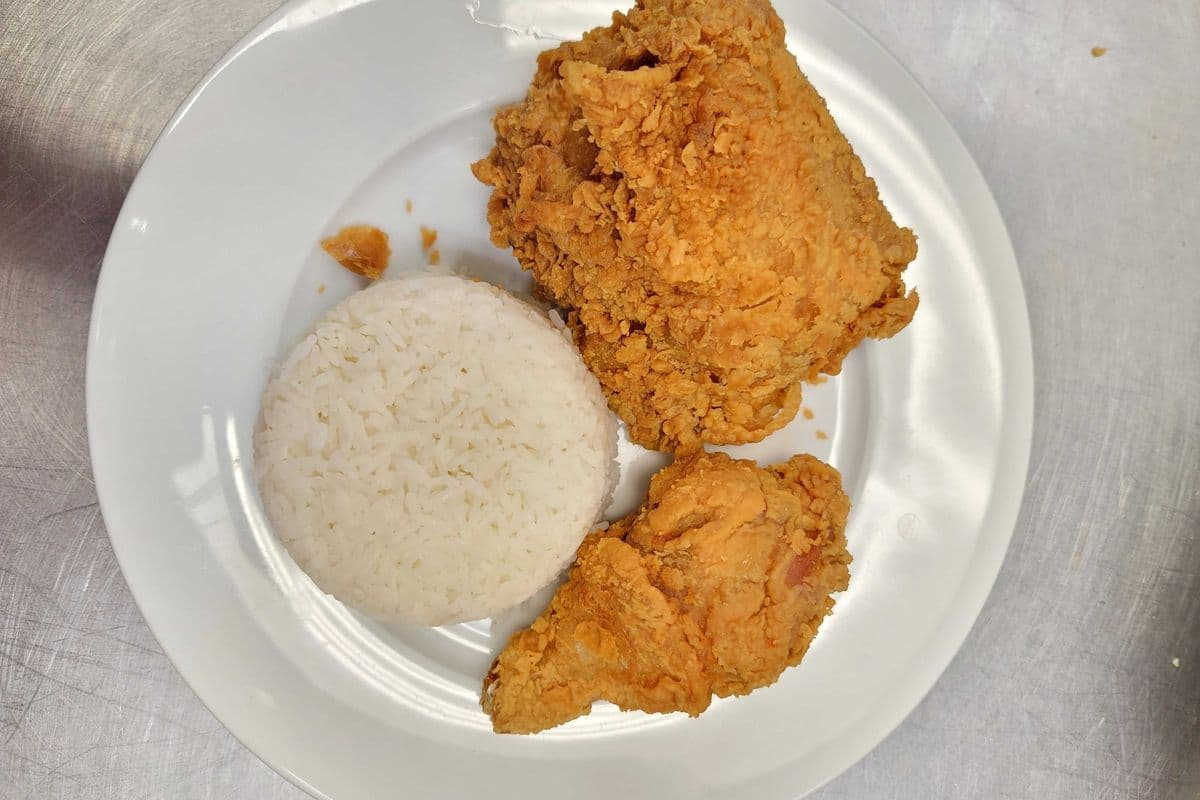 220. Chicken Meal (2 pcs chicken). with steamed rice OR French fries, and a can of pop.