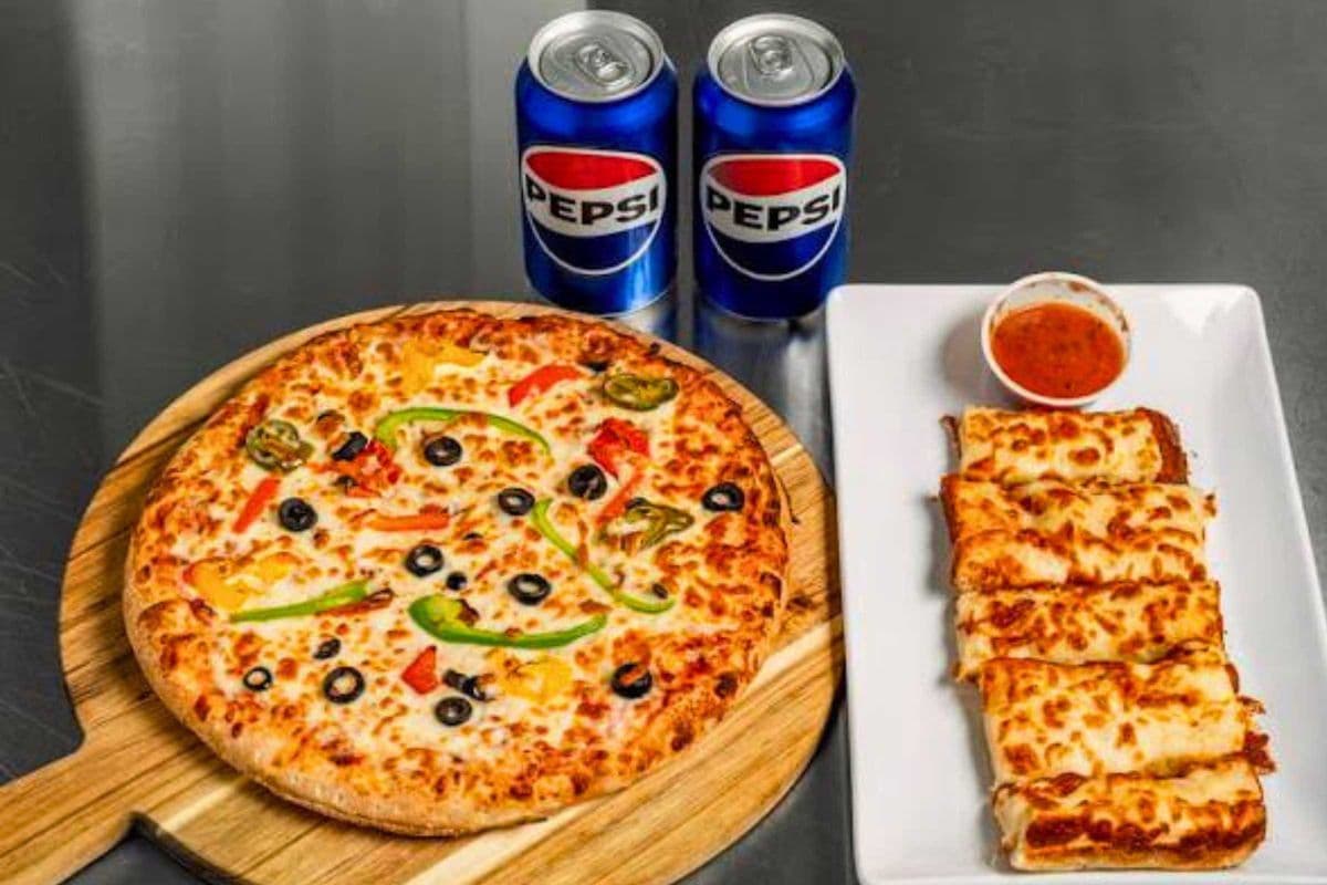 Special 1 (12" Medium Pizza) Medium pizza of your choice, cheesy bread, and two cans of pop.