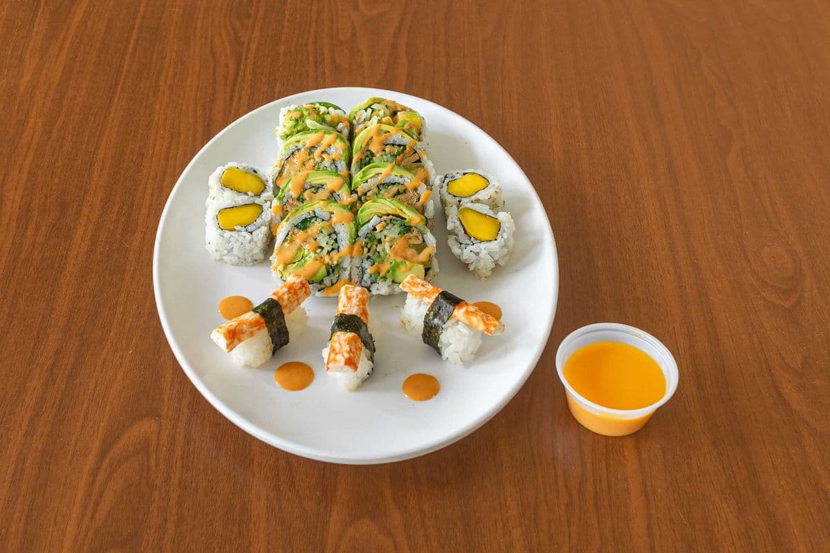 AC3. Green Veggie Dragon Roll (8 pcs), Vegan Crab Sushi (3 pcs), and Mango Roll (4 pcs)
