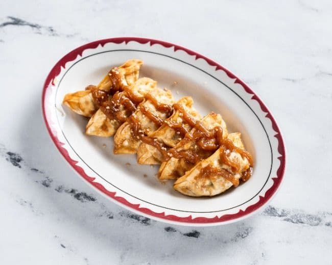 Dumplings frits au poulet (6 mcx)
