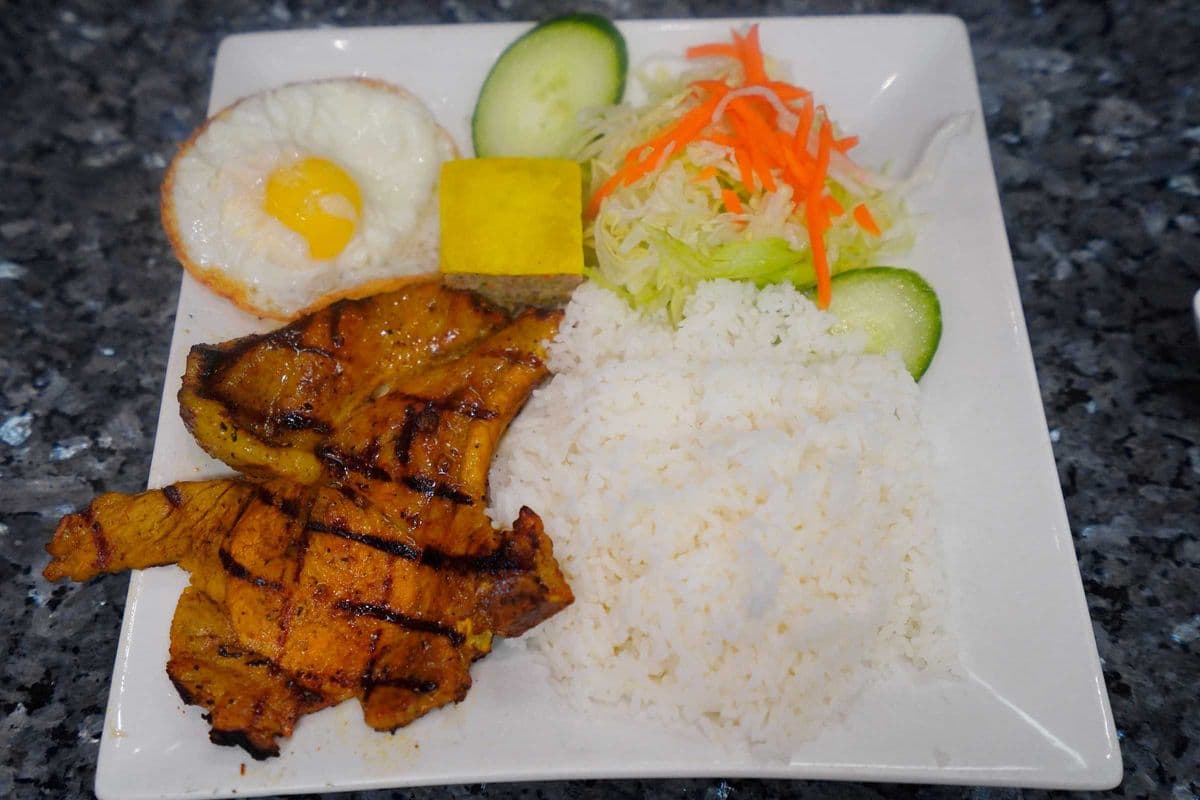 30. Grilled Marinated Pork Chop, Egg Pie, and Fried Egg with Rice ( Com Suon, Cha, Trung)