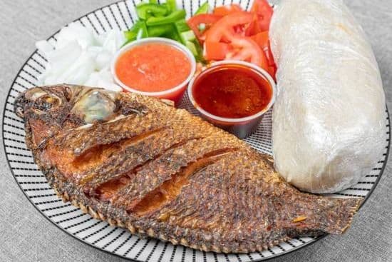 Banku and Tilapia with Specialty Peppers