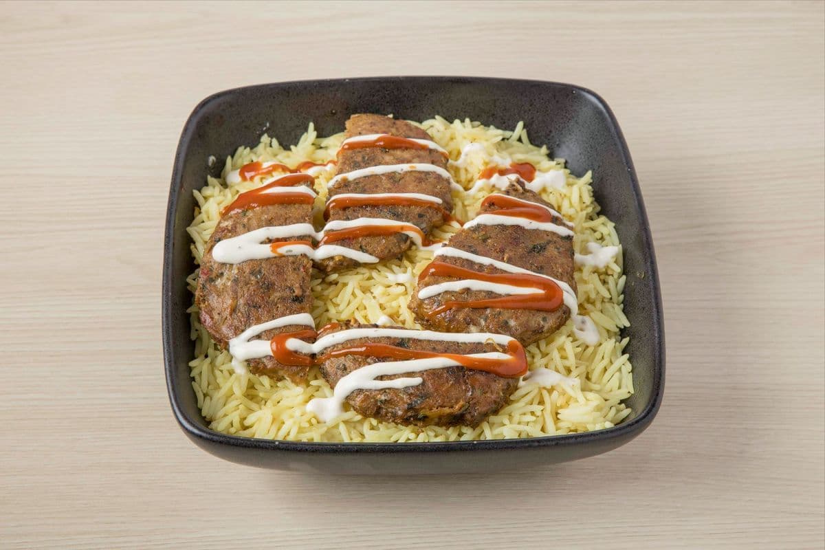 Chicken kabob on rice