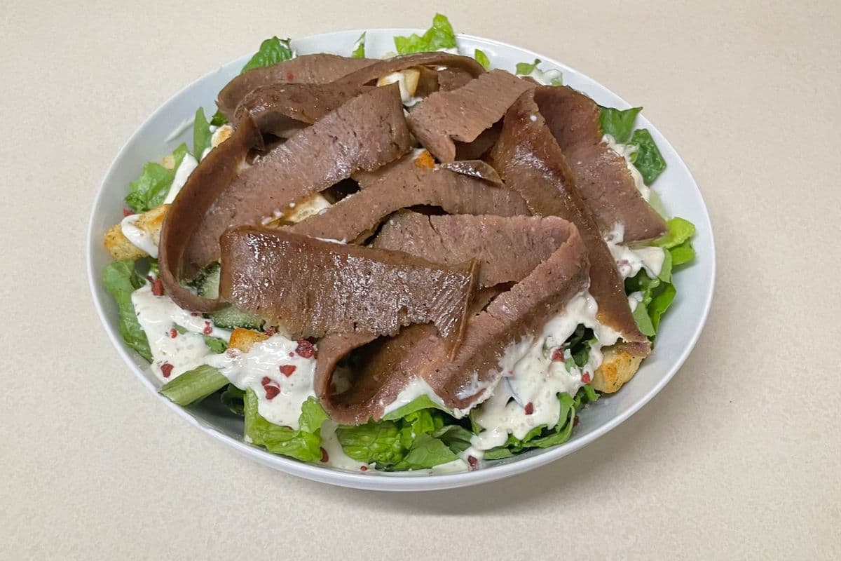 Medium Caesar Salad topped with Gyro Meat
