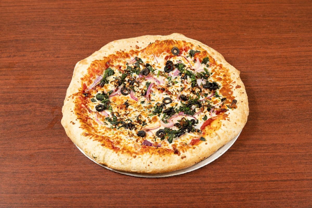 Family Deal One - One Medium Pizza with Three Toppings, Ten Wings, Three Pops, One Dip, and Wedges.