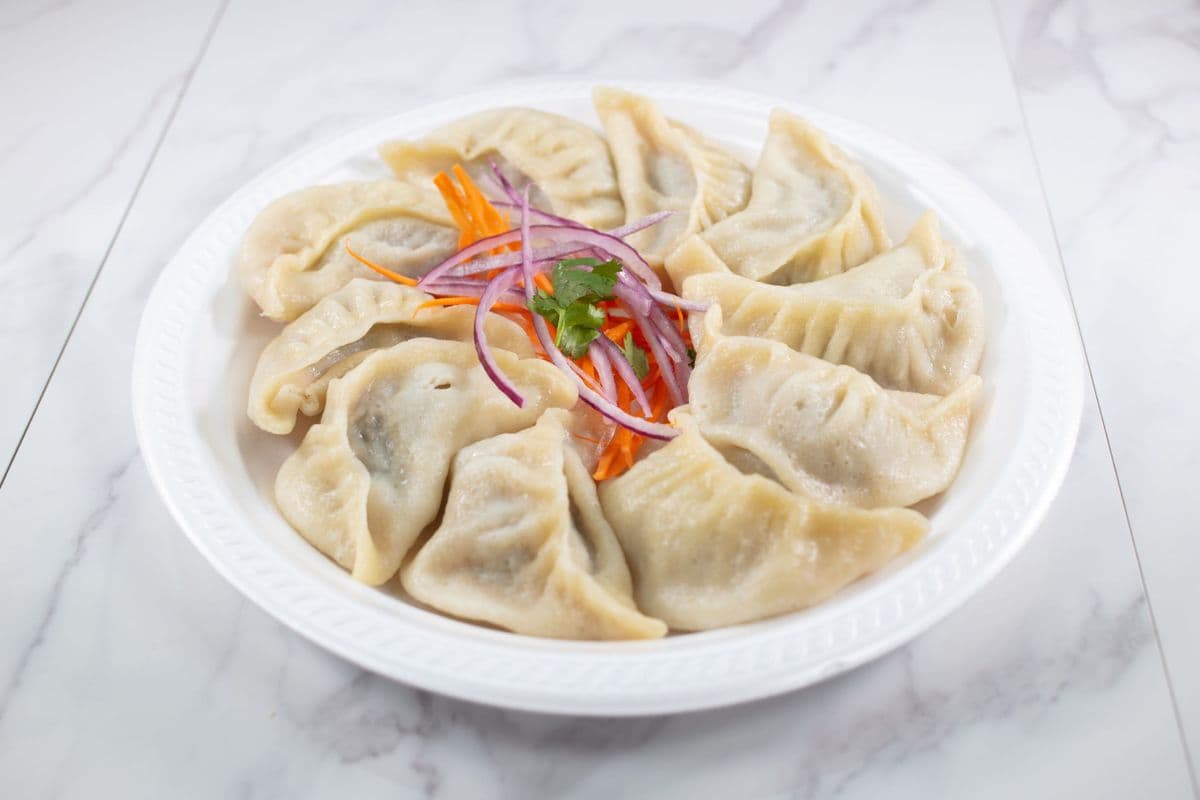 23-A. Veg Steamed Momo(10 pcs)