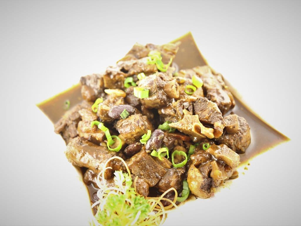 131.Oxtails w/ Peas & Rice