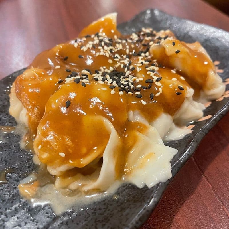 13. Porc raviolis au beurre d'arachide / 13. Pork Ravioli with Peanut Sauce