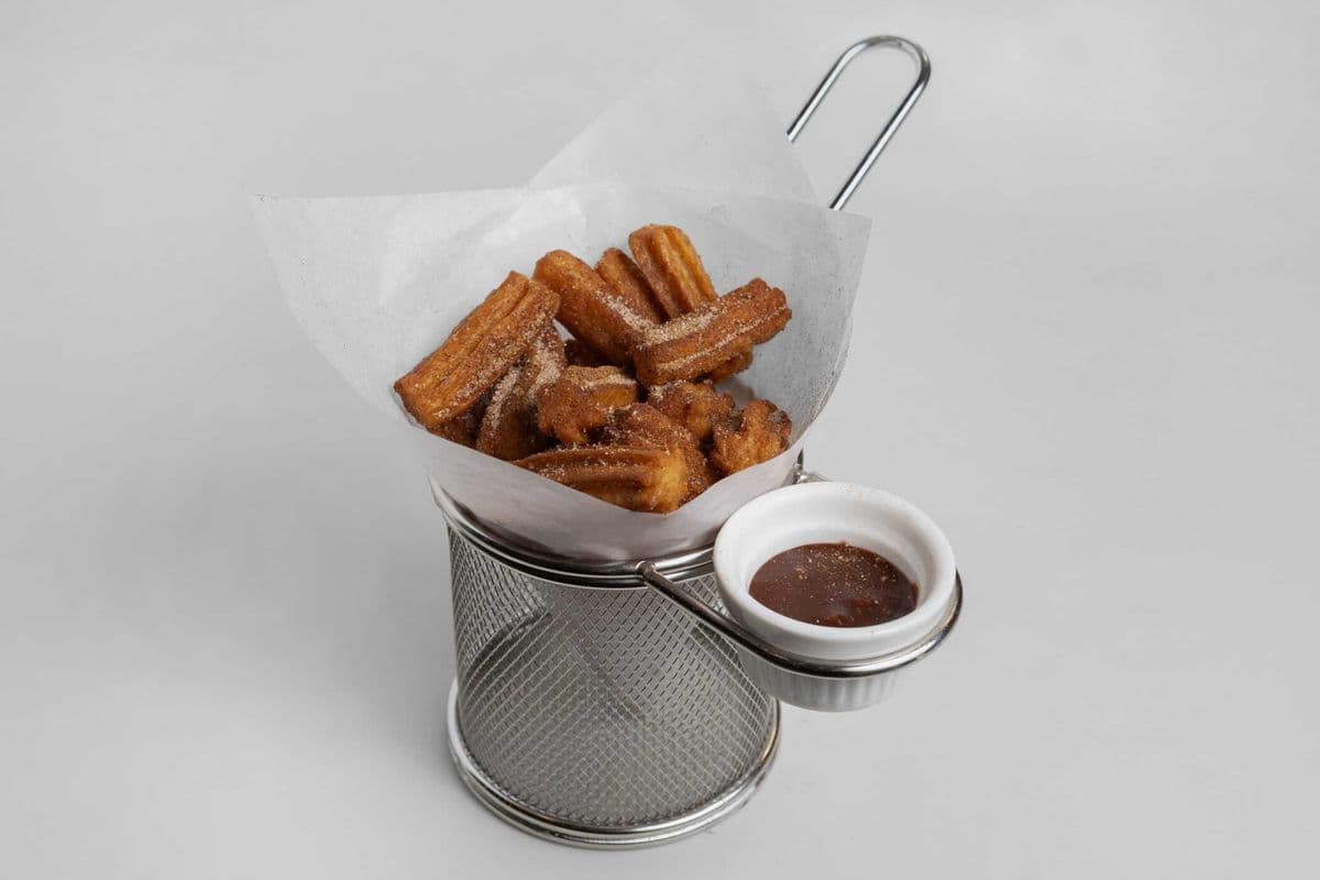 Churritos ( Churro Bites ) Sprinkled with Sugar Icing