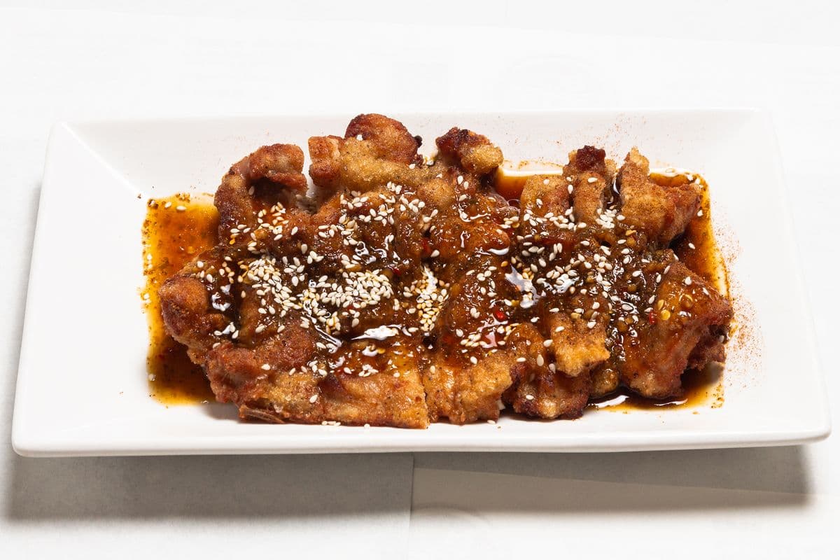 G4. Chicken Thigh with Spicy Soy Sauce 椒麻雞排