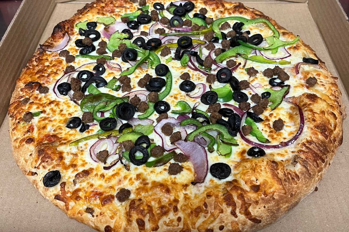 > 1 X Champion Special 18" pizza