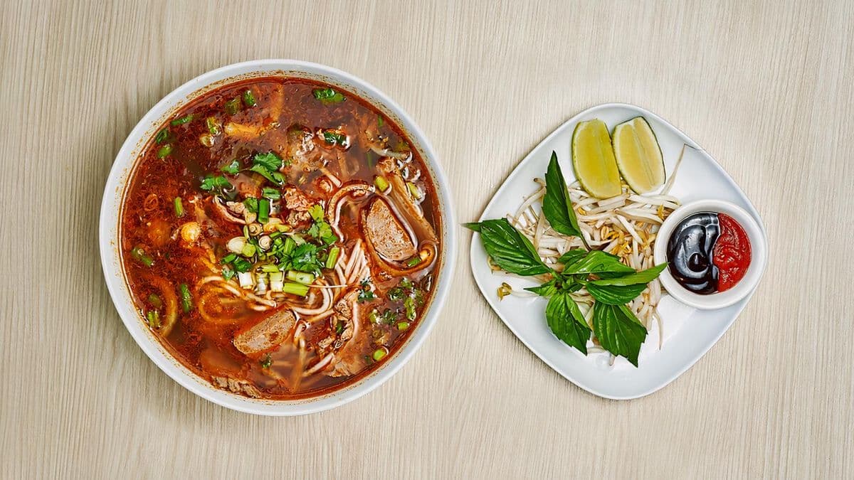 23C. Bún Bò Huế (Lemongrass Sate) Noodle Soup (Beef Served Rare & Well Done)